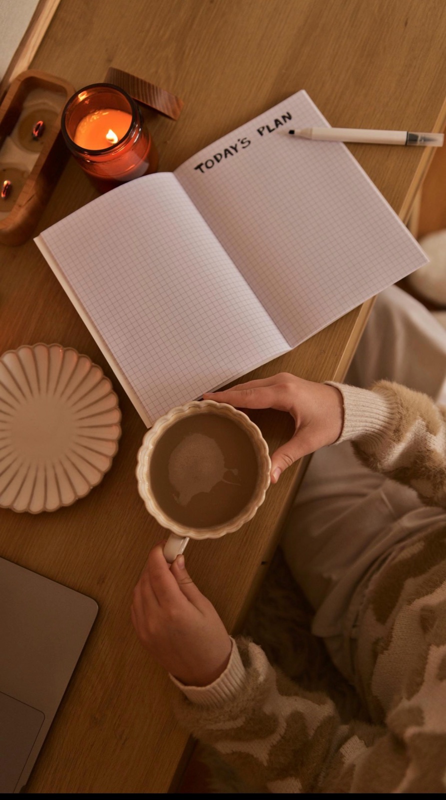 A calm morning ritual with matcha beside a notebook open to the day's plan